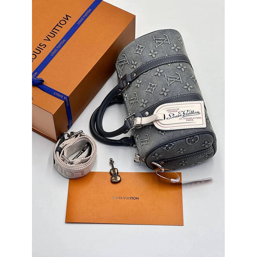 Louis Vuitton Denim Monogram Mini Duffle Bag - side view